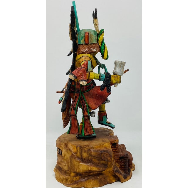 Milton Howard, is a highly collectible Native American carver. This cottonwood doll is also called Comet Katsina and...
