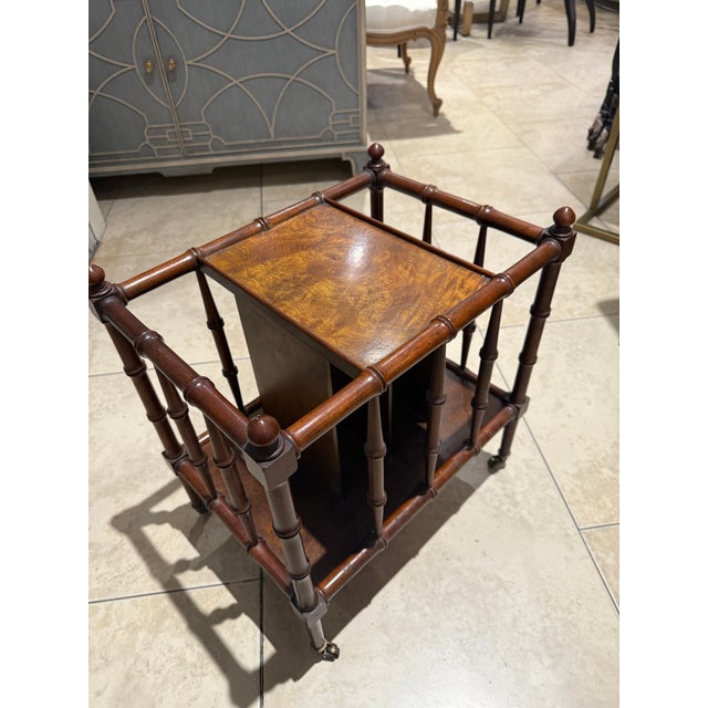 Baker Furniture Company magazine rack with inlaid burl wood and carved faux bamboo sides. Lovely original finish on a...