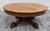 This is a gorgeous antique 44 inch Victorian quarter-sawn tiger oak round coffee table or cocktail table featuring a...
