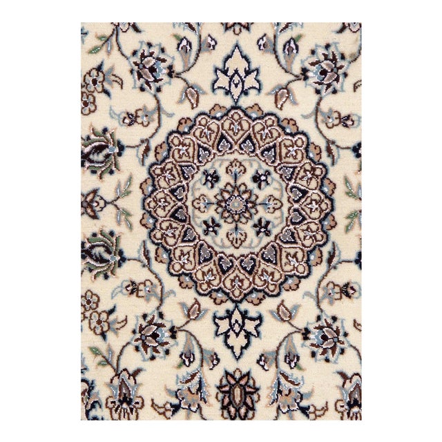 Beautiful hand-knotted Nain rug made from wool and silk. Nain is a small village located in central Asia that has...