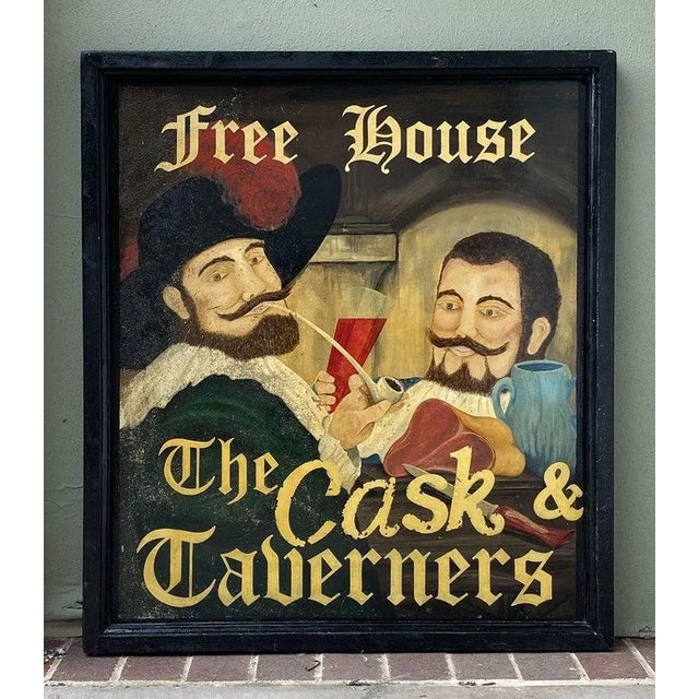 An authentic English pub sign (two-sided) featuring a painting of two revelers or publicans in Carolingian costume...