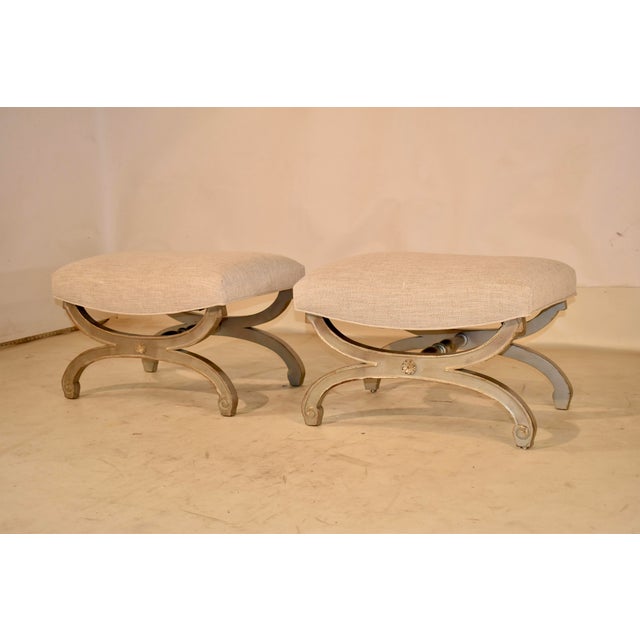 Pair of Hollywood Regency style benches, circa 1960's. This is a stunning pair of Hollywood Regency style benches in a...