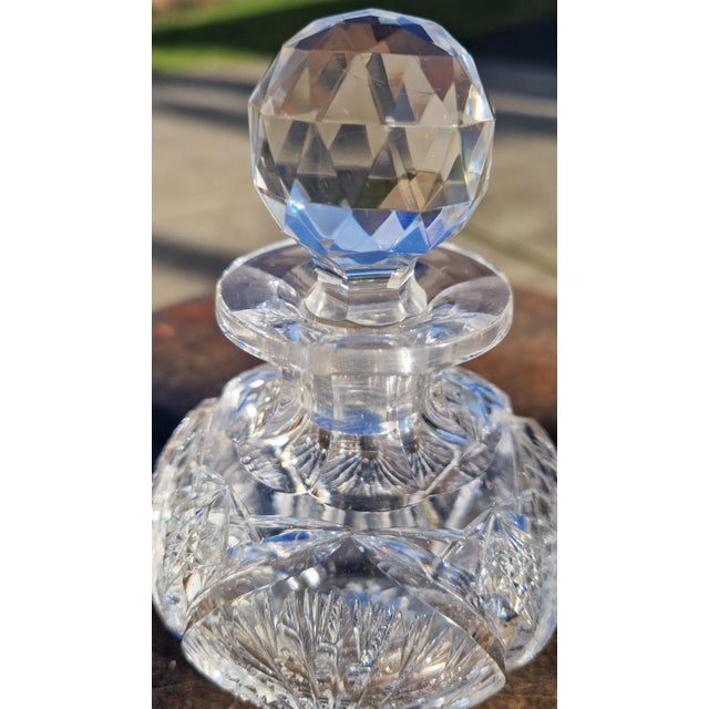 Beautiful clear Perfume Bottle American Brilliant Cut Glass, Sunburst Pattern Ray Cut Base Engraved #116 on stopper Dim:...