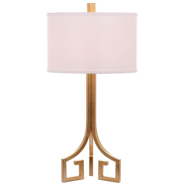 Illuminate your space with the refined elegance of the Arabelle hardback table lamp in gold. This striking piece brings a...