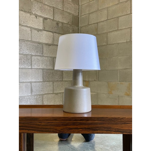 Wonderful beige/ grey ceramic body with blue speckles by famed ceramicist duo Jane and Gordon Martz for Marshall Studios....