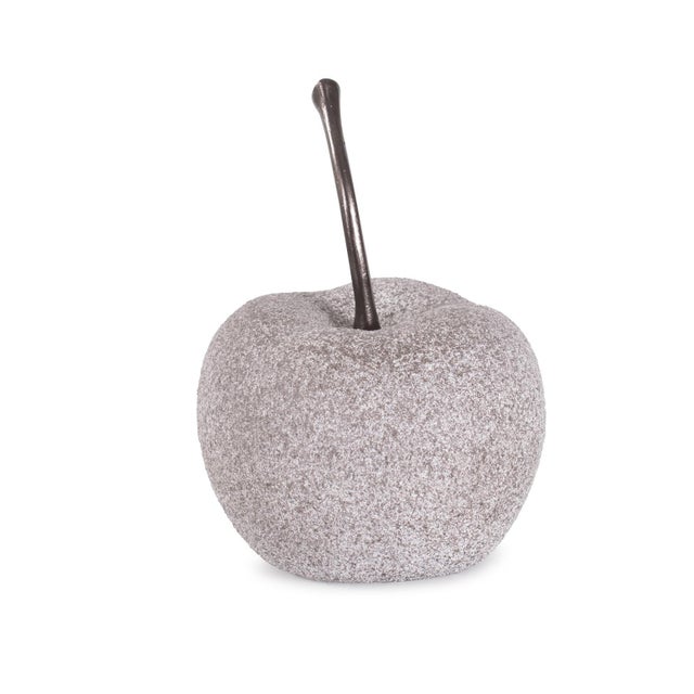 The Modern Pomme Sculpture is a contemporary reinterpretation of the apple. Crafted with meticulous attention to detail,...