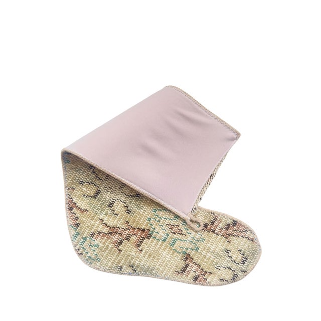 Hand-cut from a genuine vintage Turkish wool kilim, this stocking blends a warm sand and khaki ground with rust brown and...