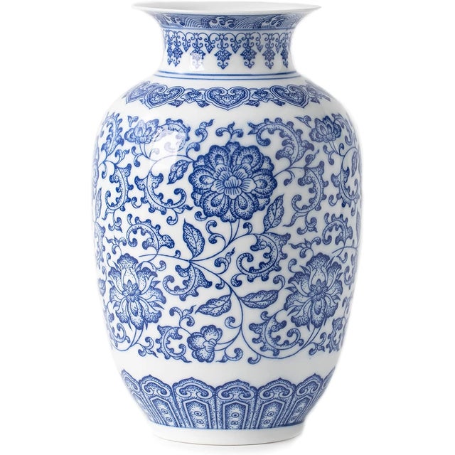 Add timeless elegance to your décor with this vintage Chinoiserie blue vase. Featuring classic Asian-inspired motifs in...