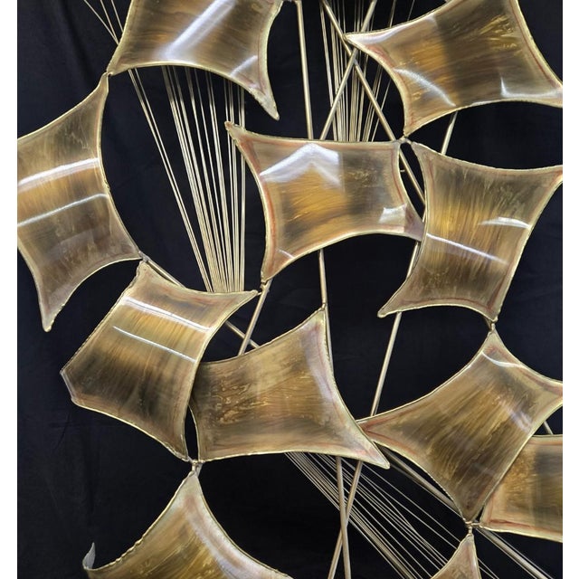Description Circa 1970's Curtis Jeré Brass Kinetic Art sculpture measuring approx. 29" x 55". Mid-century modern pieces...