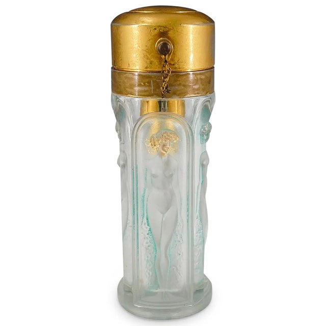 An exceptional R. Lalique France perfume bottle atomizer created for the Parisian perfume house Marny, dating to circa...