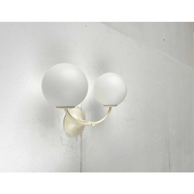 Elegant wall lamp by Temde, designed by E.R. Nele. Often mistakenly attributed to Max Bill. Classic yet timelessly modern....