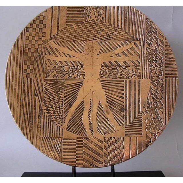 Bronze plate designed by Angelo Rinaldi (Italian, born 1942) and certified one-of-a-kind piece. Lost wax plate with the...