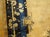 Antique Peking Square Room Size Wool Rug, Circa Date: 1900s. This exceptional Chinese textile captures the refined...