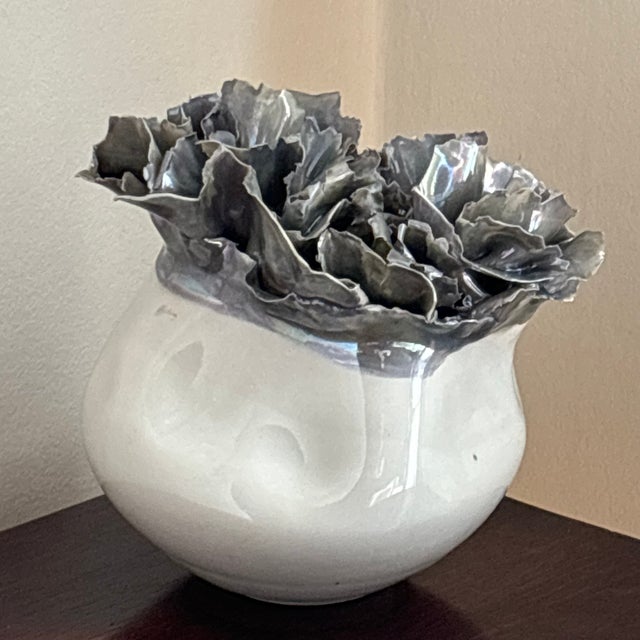 Offering a beautiful abstract porcelain sculpture by renowned ceramisist Sylvia Hyman (Tennessee, 1917-2012). Hyman was...