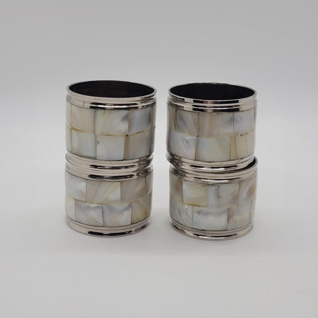 Mother of pearl napkin rings set of four features a beautiful iridescent mosaic tile design. These elegant table...