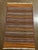 Vintage handwoven Afghan Meymana kilim flatweave rug featuring a striped field with alternating horizontal bands of fine...