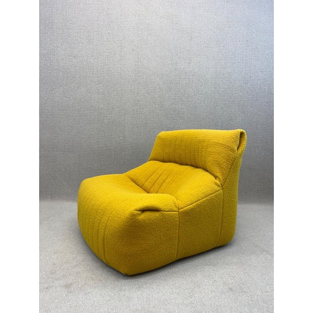 The sofa was upholstered by previous owner This piece has an attribution mark, I am sure that it is completely authentic...