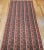 A rare and exquisitely preserved mid-19th century hand woven Kashmiri shawl from Northwest India, showcasing a richly...