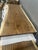 One tree. One top. One of one. A true single-slab live edge table: one continuous cross-section of a single Saman tree...