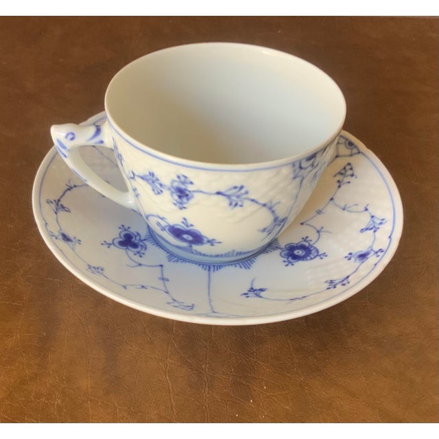 Royal Copenhagen blue fluted plain pattern Cup 4”width x 3.5”depth x 2.5”height Saucer 6” diameter x 1”height