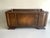 An exceptional Art Deco sideboard from the 1930s – crafted from exquisite walnut with a striking burl veneer that...