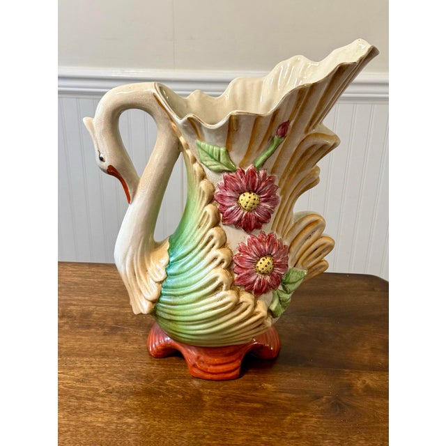 This substantial sized Majolica swan vase/pitcher is a decorative focal point that embodies the spirit of the Art Nouveau...