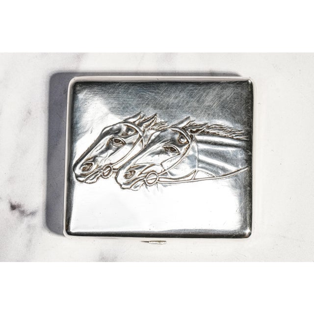 An exceptional example of pre-Revolutionary Russian silverwork, this antique 875 silver cigarette case dates to the...