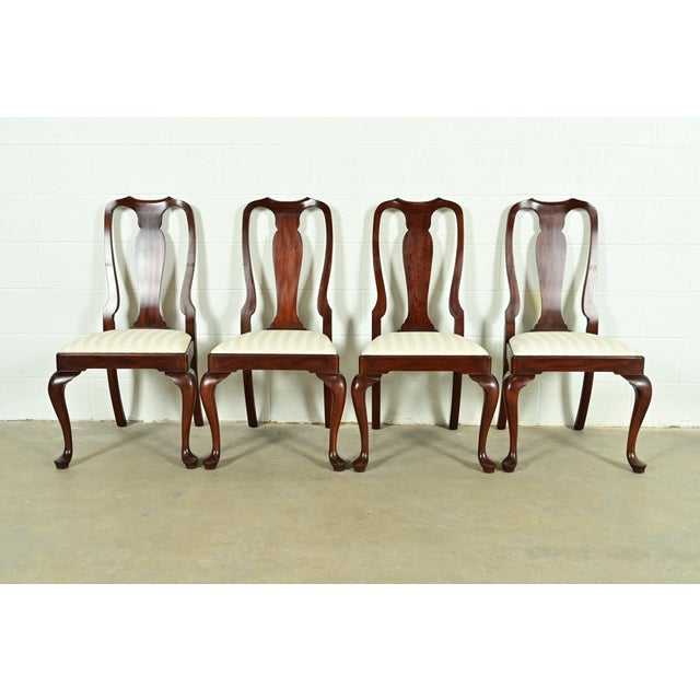 An outstanding set of four Queen Anne or Georgian style dining chairs By Henkel Harris USA, Circa 1980s Solid mahogany...