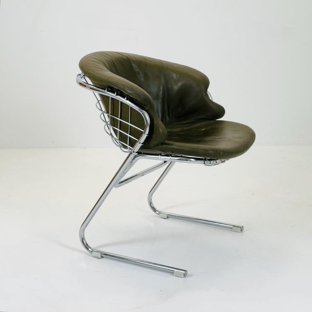 The armchair designed by the renowned Gastone Rinaldi in the 1970s. Crafted in Italy, these chairs exemplify mid-century...
