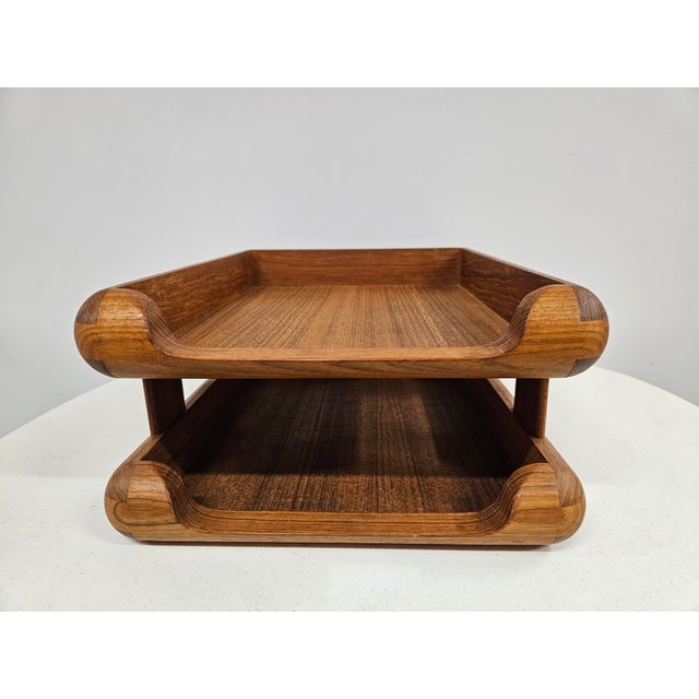 This solid teak double tray letter or desk organizer has rounded corners and sides with beautiful woodgrain. The tray is...