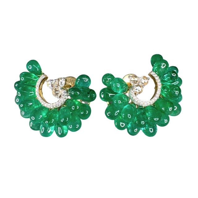 Elegant and playful, these vintage style earrings feature vibrant emerald briolettes arranged in a charming grape bunch...