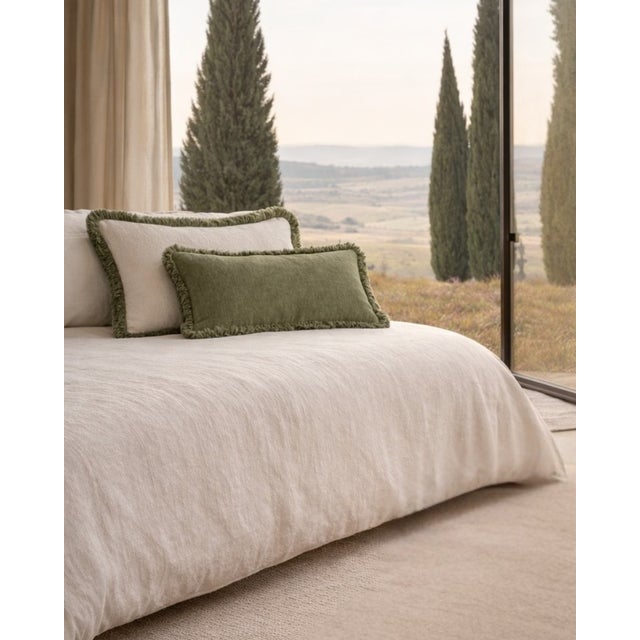 The contrasting chromatic scheme characterizing these couple of cushions lends it a distinct luxe yet restrained allure....