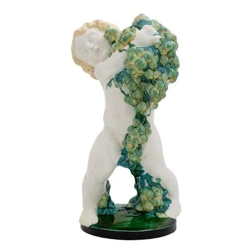 Ceramic Putto with green grapes “Autumn”, design Michael Powolny, execution Wiener Keramik, ca. 1907, ceramics colorfuly...