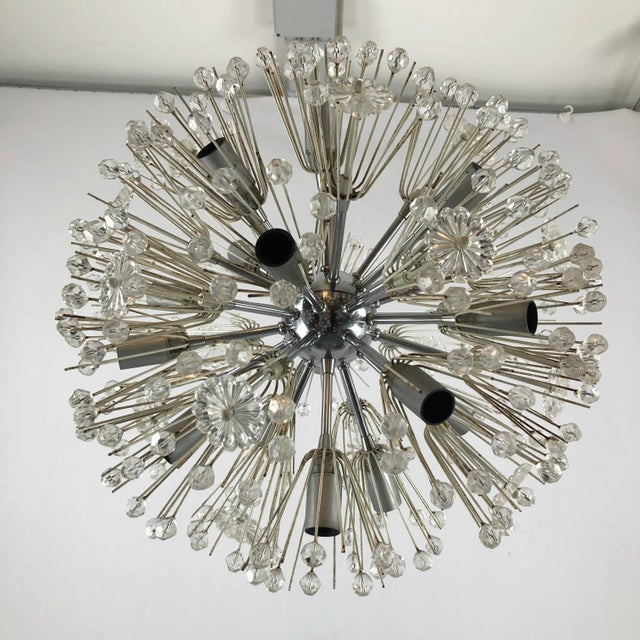 Good vintage condition for this chrome and lacquer Sputnik designed by Emil Stejnar and produced from Kalmar during the...