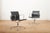 Swivel Chair EA 104 in Chrome-Plated Aluminum and Black Leather Upholstery by Ray and Charles Eames for Vitra, 1958, in...