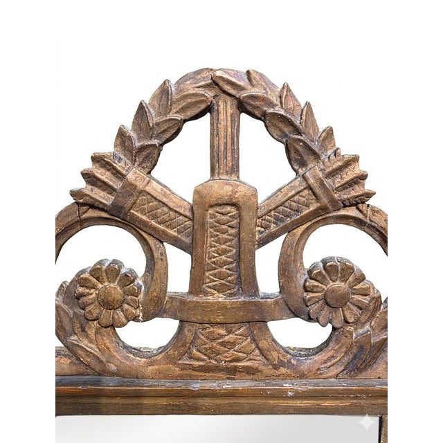 A Louis XVI period wedding mirror in gilded wood, traditionally given to newlyweds as a token of prosperity and fidelity....