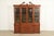 A gorgeous Georgian or Chippendale style lighted breakfront bookcase or dining cabinet By Henredon USA, Late 20th Century...