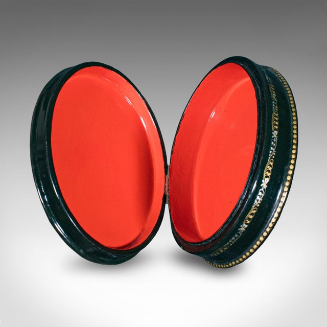 This is a vintage oval keepsake box. A Russian, papier-mâché and lacquer lidded trinket case, dating to the Art Deco...