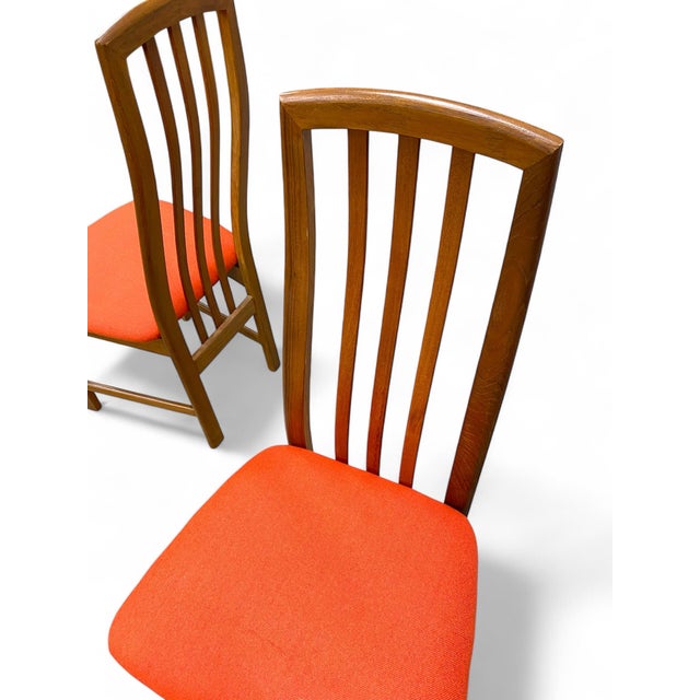 Set of four teak postmodern dining chairs. These have been stripped, stained and sealed and are in excellent vintage...