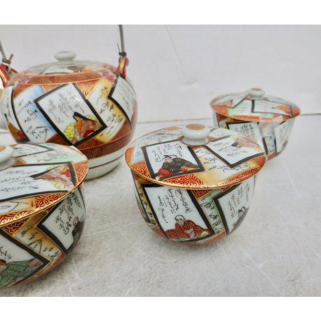 A beautiful mid-century Japanese set of Japanese porcelain Tea service. The pattern on all pieces is an overlay of...