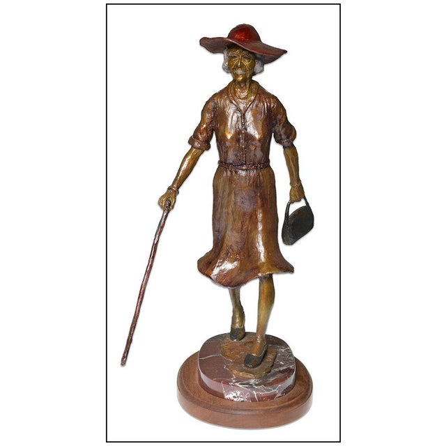 The artwork here, "A Stroll Through Time", is a wonderful depiction of an old woman waking with her cane and purse in...