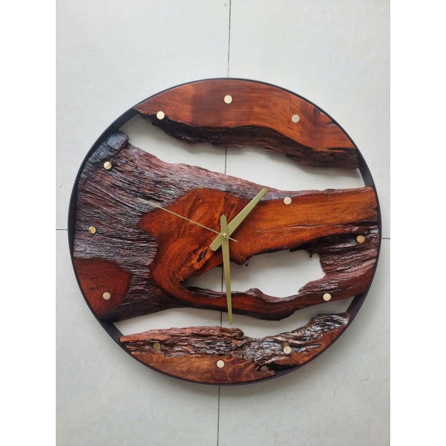 Flow of Time is a one-of-a-kind handcrafted wall clock sculpture created from naturally shaped, hard driftwood. Rather...