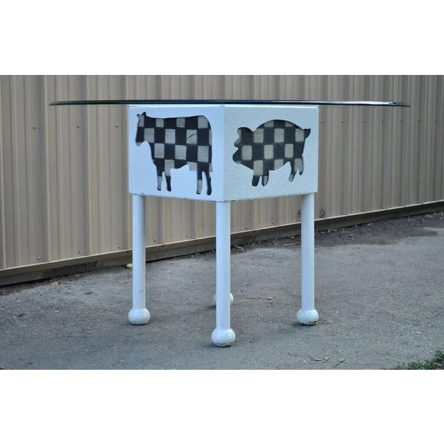Vintage Farmhouse Cow & Pig Painted White & Black Metal & Glass Island Center Table. Item features 48" round glass top,...