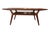 An elegant and well-proportioned Danish teak coffee table with a design language that catches the eye from all angles. The...
