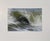 This artwork depicts a dynamic wave, capturing the fluidity and energy of the ocean through soft pastels on paper. The...