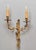 Wall lamps made of cast brass in the louis xv style. Heavy. Detailed workmanship. The lamps each hold two bulbs with an...