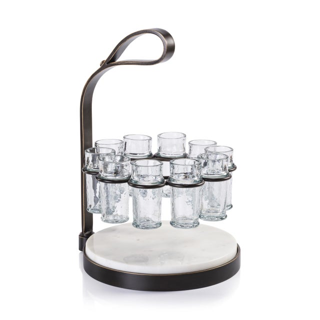 The Tequilero 10-Piece Tequila Shot Set is the perfect blend of style and functionality. Featuring a durable iron frame...