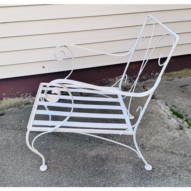 Vintage 1960s White Wrought Iron Lounge Chair A classic example of mid-century indoor-outdoor design, this vintage 1960s...