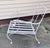 Vintage 1960s White Wrought Iron Lounge Chair A classic example of mid-century indoor-outdoor design, this vintage 1960s...