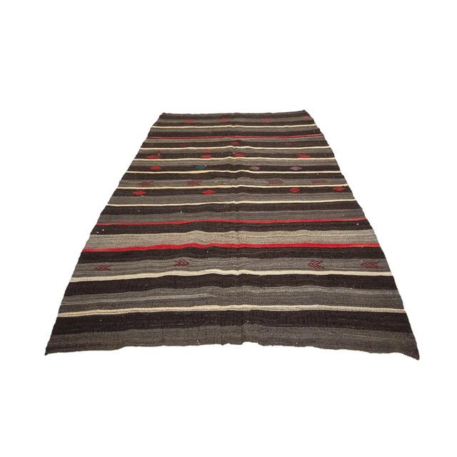 Vintage handwoven decorative kilim rug from Afyon region of Turkey. Approximately 50-60 years old. In very good condition.
